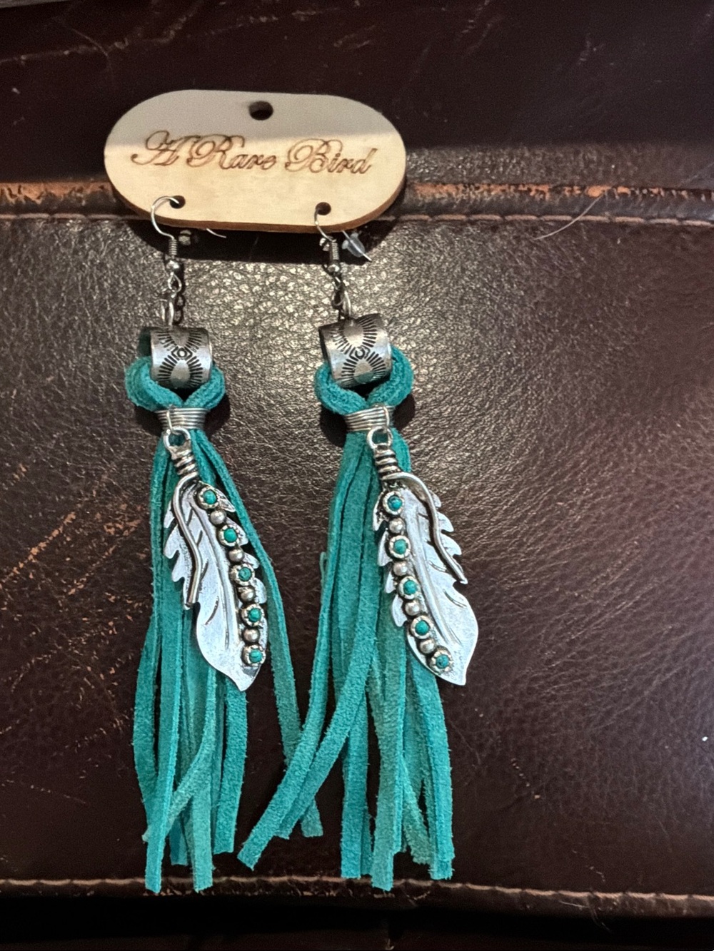 A Rare Bird Teal Suede Tassel Feather Drop Earrings